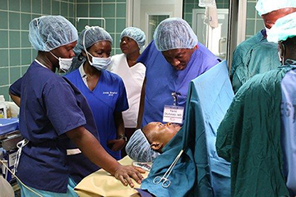 Dr. Olufolabi teaching students how to give a general anesthetic during Caesarean section