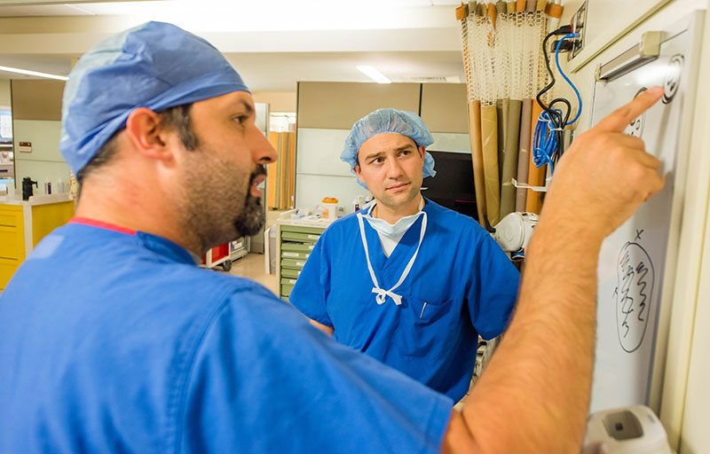 Dr. Martinez teaching a fellow.