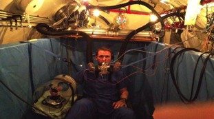 Co-investigator, Bruce Derrick, MD testing the apparatus prior to a trial run to 200 EAD + CO2.