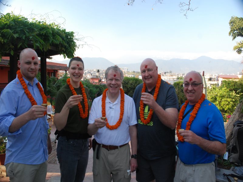 Peter Moon, Anna Grodecki (former Duke Hyperbaric Fellow) Richard Moon, Gene Moretti, and Chris Young took part in a traditional Buddhist blessing prior to making final preparations for the trek