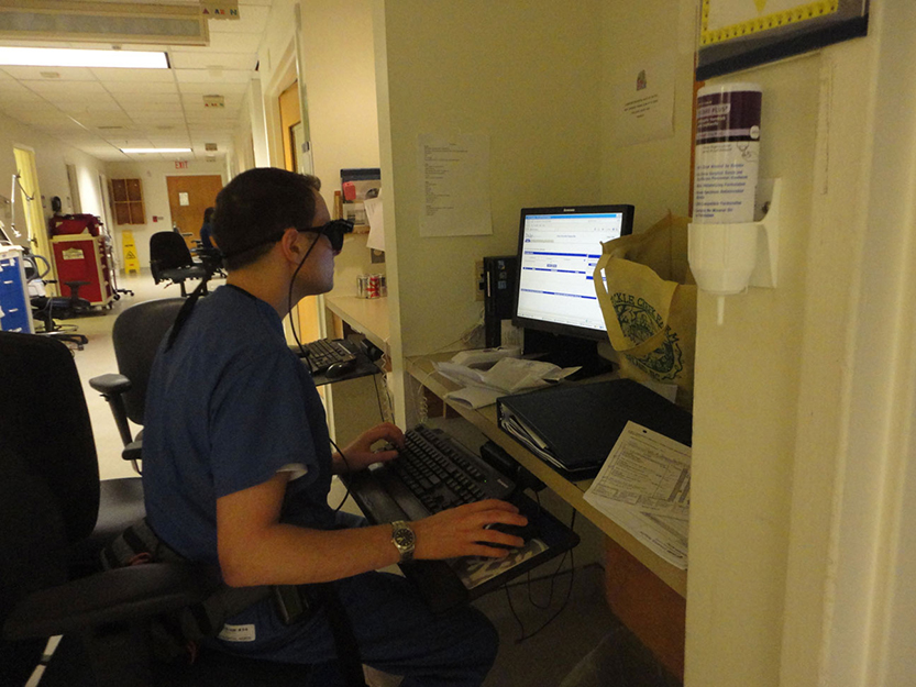 Student doing an eye tracker project at the Simulation Center