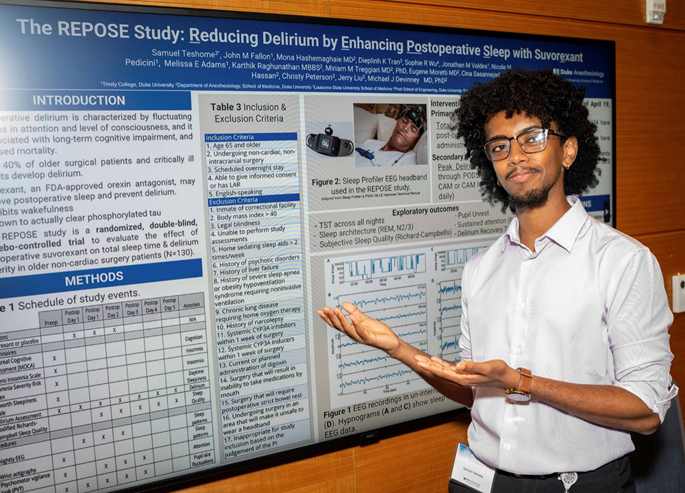 Sam Teshome, medical student, presenting his research at Academic Evening