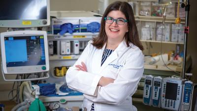 Dr. Elizabeth Malinzak in a OR setting.