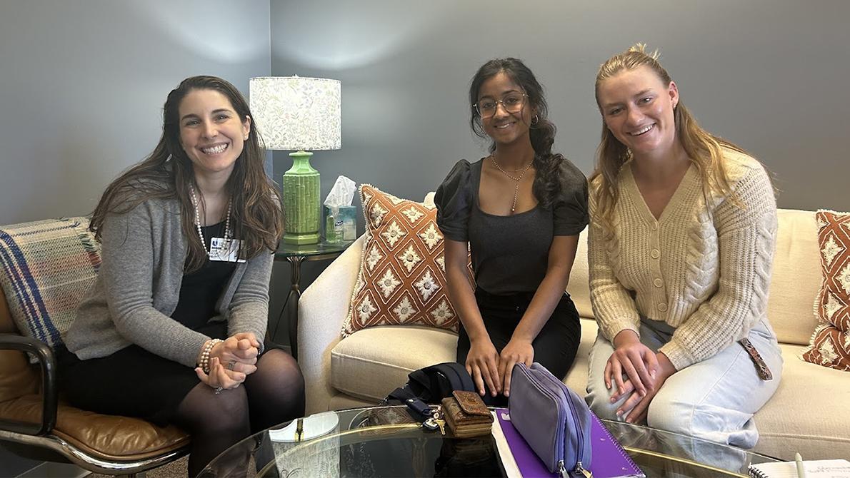 Dr. Leah Acker (left) poses for a photo in her office with Nishka Goggi (center) and Abigail Keaton (right). Photo courtesy of Hector Sanchez Melendez.