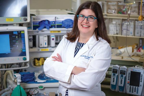 Dr. Elizabeth Malinzak in a OR setting.