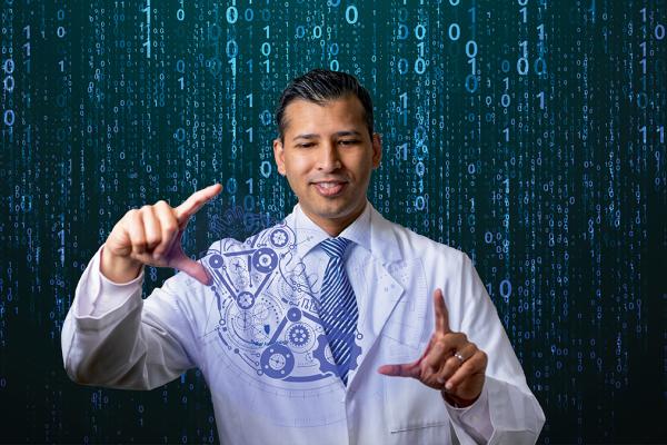 Dr. Neal Ray standing infront of a digital abstract wall