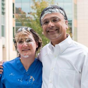 Drs. Thompson and Mathew at the 2014 Pie in the Face Global Health Fundraiser